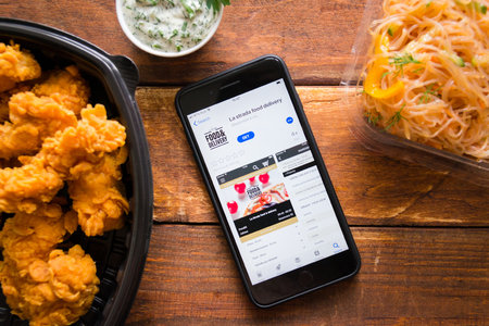 Stavropol, Russian Federation. June 10, 2019. Smartphone with mobile application la strada food Delivery La Stradaのeditorial素材