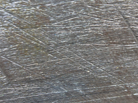 metal texture is scratched with a metal file.