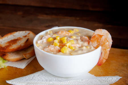 Homemade clam chowder with shrimp, top view.の写真素材