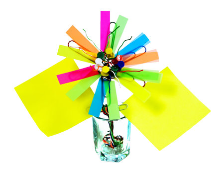 Instalation in wineglass set of old keyboard buttons, colored stickers, colored paper clips and...
