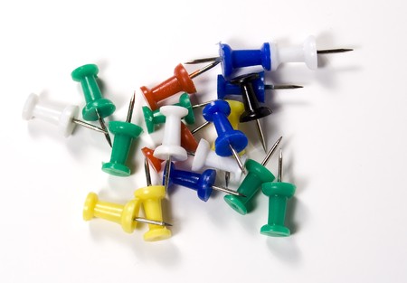 set of colored pushpins on white backgroundの写真素材