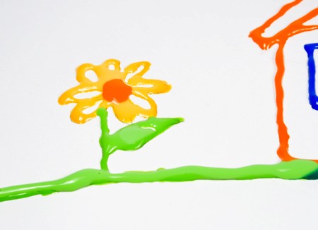 Drawing of the house with a flower on paperの写真素材