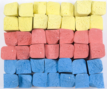 Stacked in rows group colored crushed chalks
