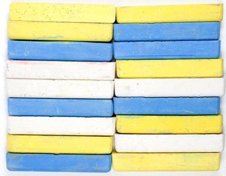  Two vertical rows of colored chalks, background