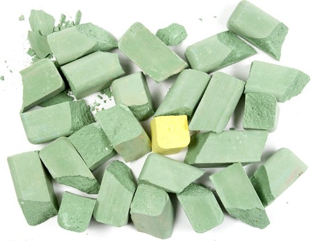 Small group of green chalks with one yellowの写真素材