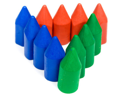 Triangle from red. blue and green wax pencils