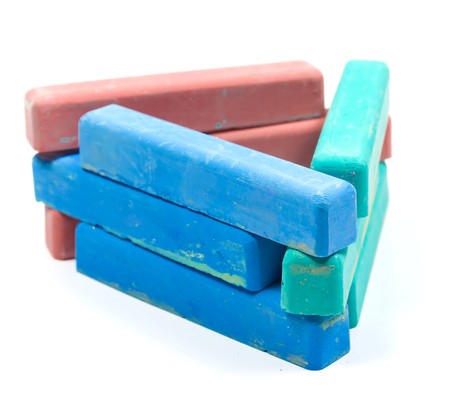 Triangle from children colored chalk on whiteの写真素材