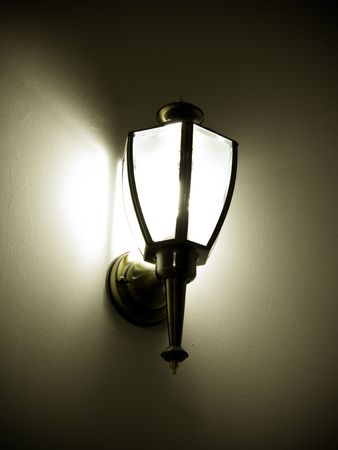 wall lamp throuwing shadows aroundの写真素材