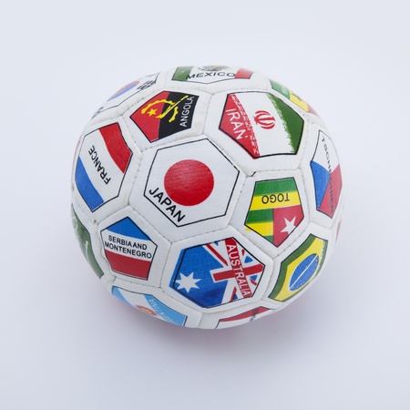 small soccer ball with flags isolated on white backgroundの写真素材