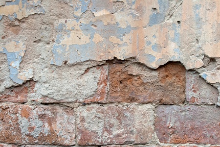 old brick wall with plaster colorの写真素材