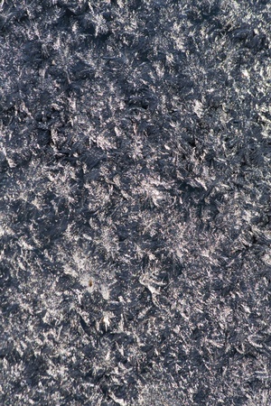abstraction caused by winter frosts on glassの写真素材