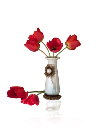 image with tulips in vase on white background, isolatedの写真素材