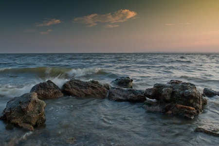 river stones to hit the waves