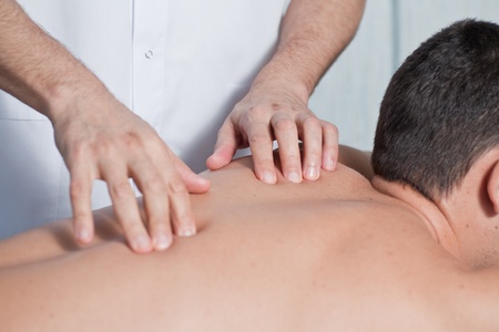 the hands of a massage that applies a massageの写真素材
