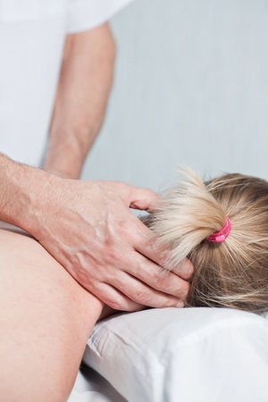 the hands of a massage that applies a massageの写真素材