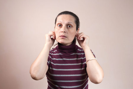 Closeup portrait of beautiful emotional playful womanの写真素材