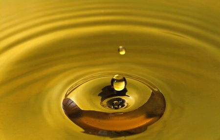 The round transparent drop of waterの写真素材