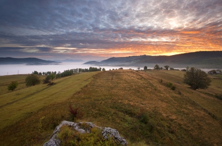 Majestic sunset in the mountains landscape.の写真素材