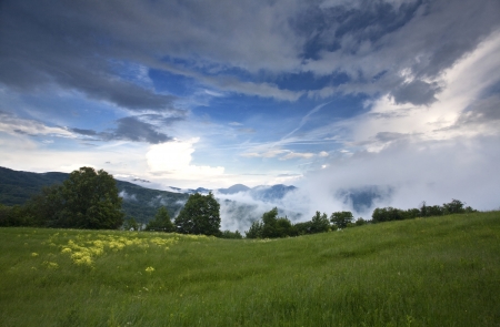 Mountain landscape with clouds before the rainの写真素材