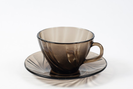 brown glass cup on white backgroundの写真素材