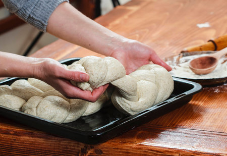 Chef preparing dough in a kitchenの写真素材