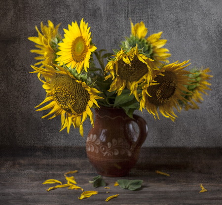 Still life with sunflowers on the tableの写真素材
