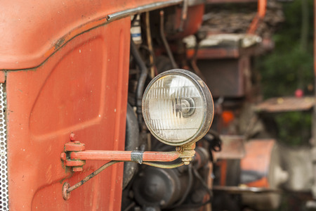 Close up of an old lamp from a tractorの写真素材