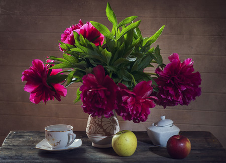 still life red peoniesの写真素材