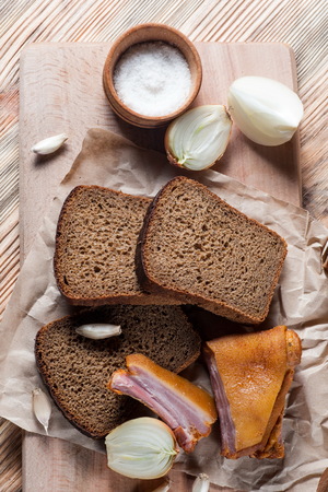 black bread with smoked meatの写真素材