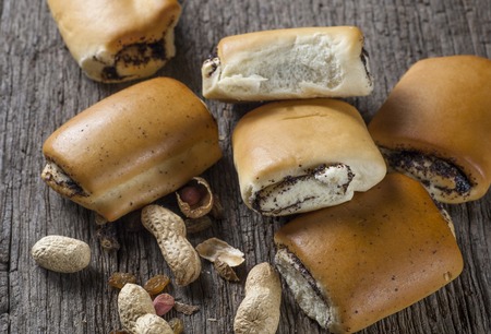 buns end nuts on old wooden backgroundsの写真素材