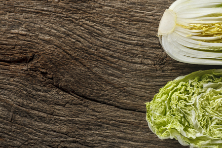 cabbage on old wooden backgroundの写真素材