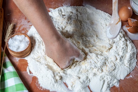 baker prepared dough for bakingの写真素材