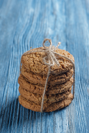 Biscuits tied with string on vintage wooden tableの写真素材