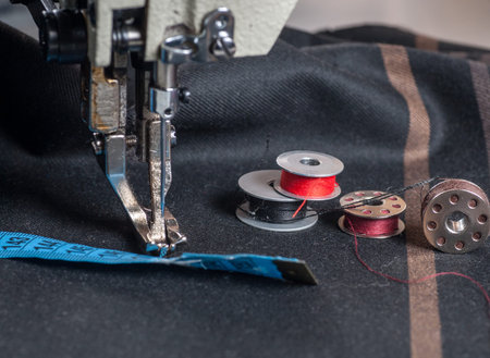 Close shot of an industrial sewing machine