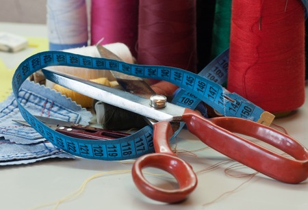 still life of spools of thread on a wooden backgroundの写真素材