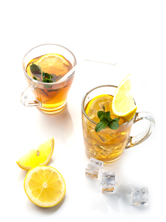 Two glasses of iced tea with lemon isolated on white backgroundの写真素材