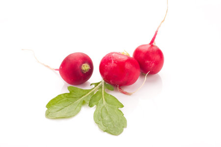 Fresh radish isolated on white bacground. Natural food.