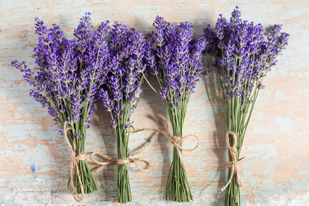 bunch of lavander on old wooden background.の写真素材