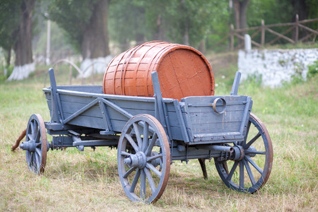 Old cart with barrelの写真素材