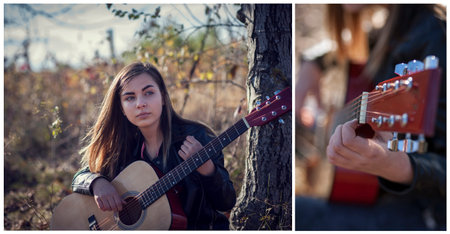 Portrait of a girl with a guitar in the autumn park