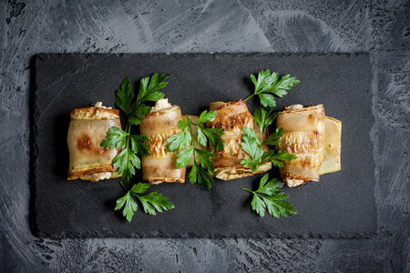 Wrapped zucchini with cheeseの写真素材