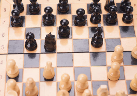 Close up Wooden Chess Pieces on Board