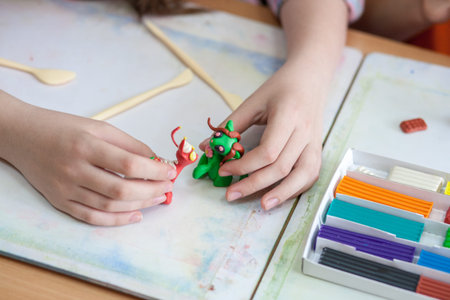 pupils modeling in plasticine in clasroom
