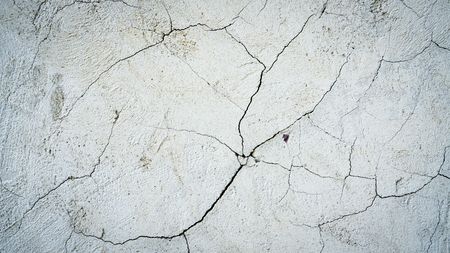 Old plastered wall with spots from waterの写真素材