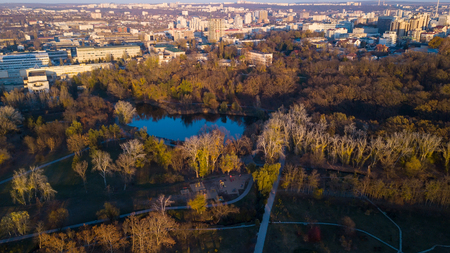 Aerial view of the autumn city park near the lake. Beautiful view of nature. Moldova Kishinev.の写真素材