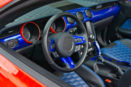 View of the interior of a modern automobile showing the dashboard. Tuning. Supercar. Karbon. Europe....