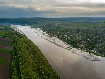Arial view over the river and small village. Dniester river of Moldova republic.の写真素材