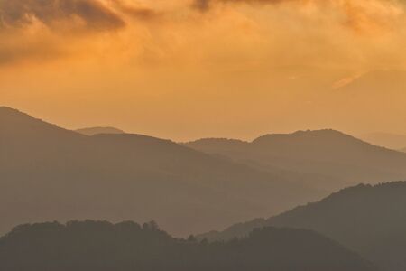 Magestic sunset in the carpatian mountains. Natural autumn landscape.の写真素材