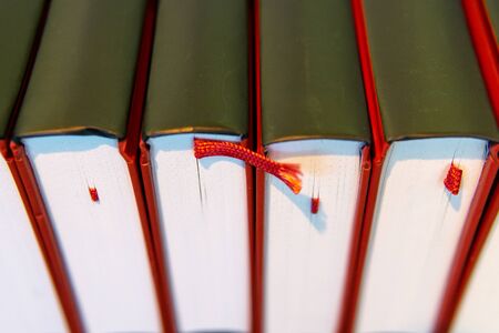 book row on a shelf close-upの写真素材
