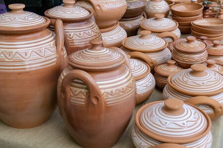 The fair of folk craftsmen of pottery. Handmade clay potsの写真素材